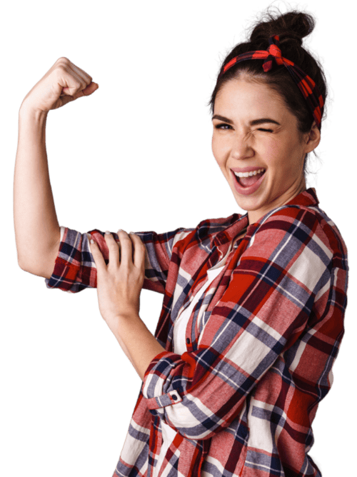 A person in a plaid shirt and headband flexes their arm confidently, smiling with a wink against a plain black background.