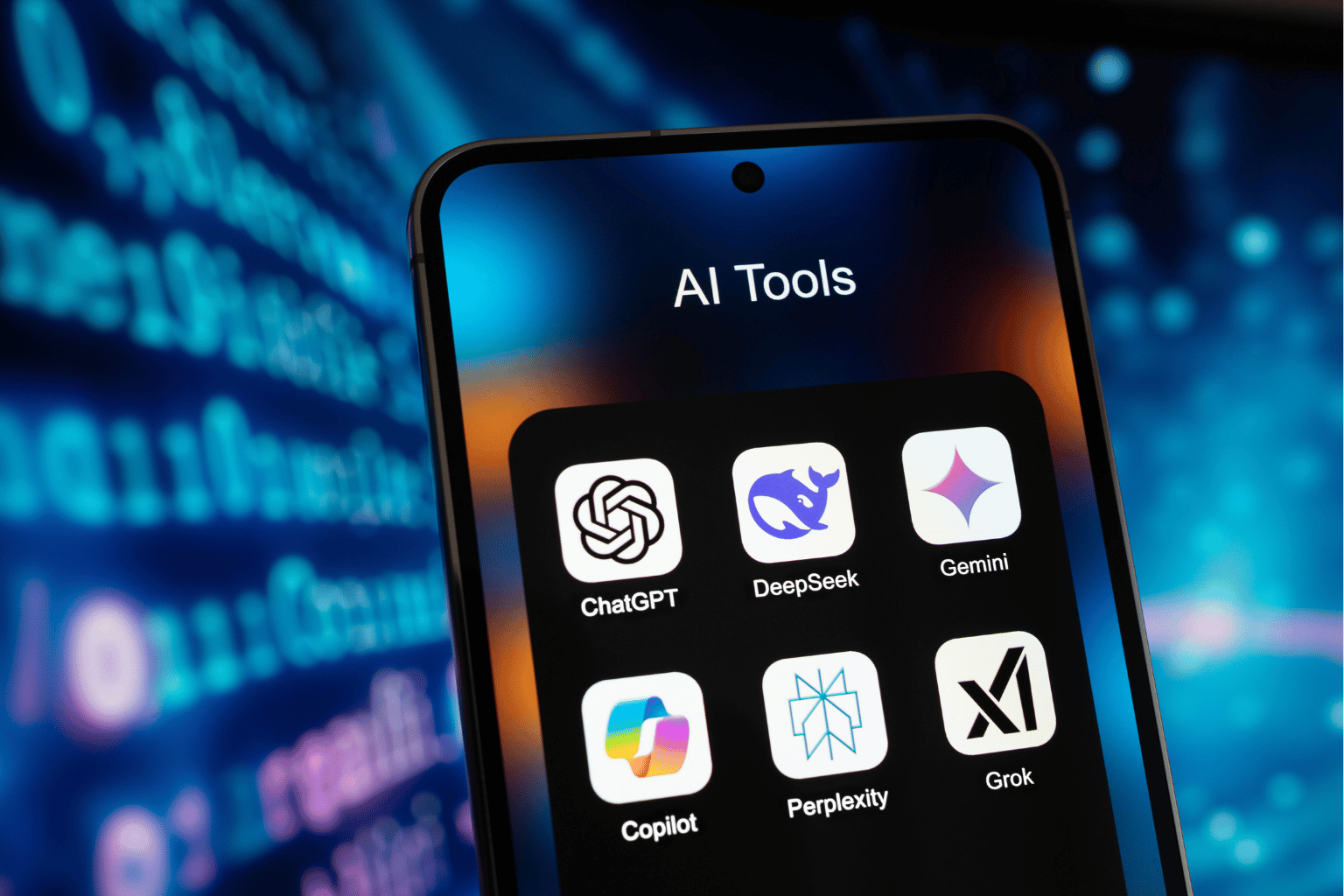 Close-up of a smartphone screen displaying an AI Tools folder with several app icons against a blue digital background.