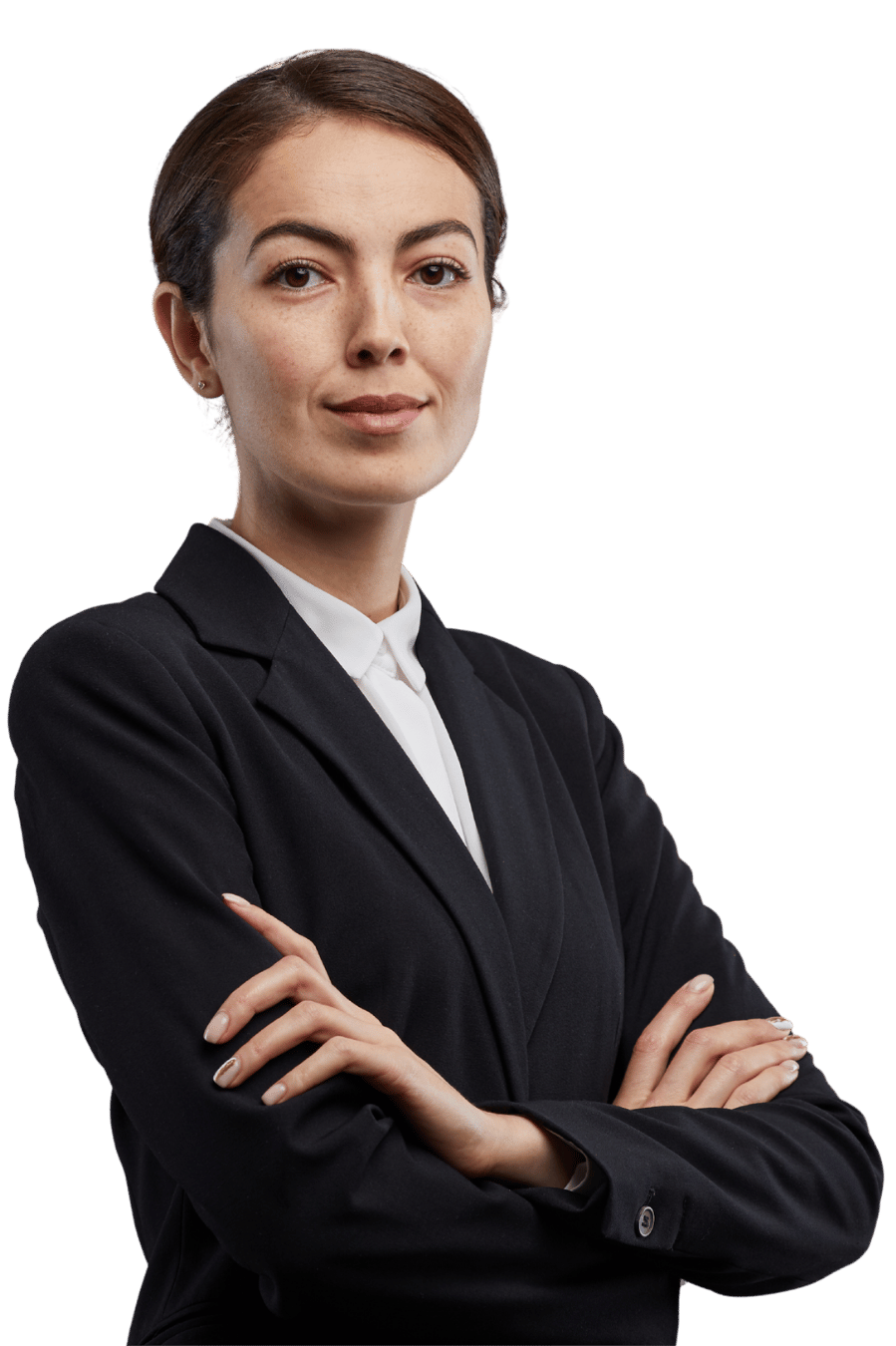 Portrait of a professional woman in a black blazer with arms crossed against a dark background.